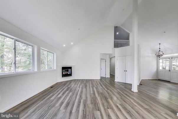 Empty room, Fireplace, Interior, Pendant Lights, Recessed Lighting, Wood Texture Flooring
