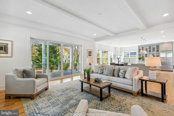 Chandelier, Dining room, Interior, Kitchen, Living room, Pendant Lights, Recessed Lighting, Stainless Steel Appliances, Wood Texture Flooring
