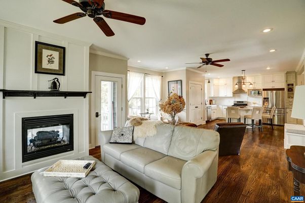 Fireplace, Interior, Kitchen, Living room, Pendant Lights, Recessed Lighting, Stainless Steel Appliances, Wood Texture Flooring