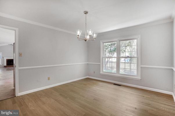 Chandelier, Empty room, Fireplace, Interior, Pendant Lights, Wood Texture Flooring