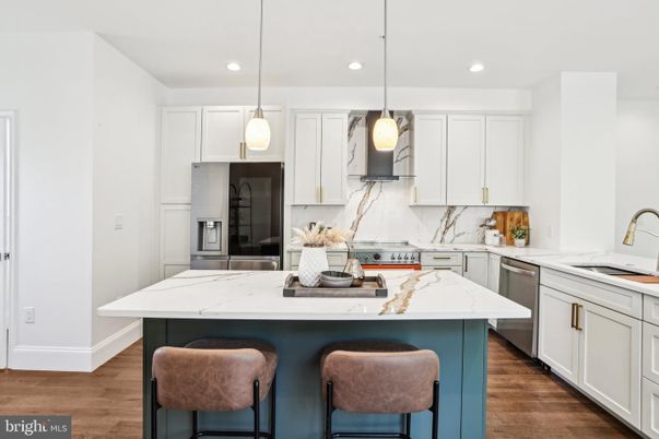 Interior, Kitchen, Marble Walls, Pendant Lights, Recessed Lighting, Stainless Steel Appliances, Wood Texture Flooring