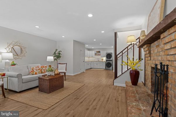 Fireplace, Interior, Kitchen, Living room, Recessed Lighting, Stone Walls, Wood Texture Flooring