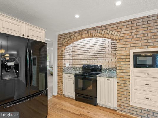 Interior, Kitchen, Recessed Lighting, Stainless Steel Appliances, Stone Walls, Wood Texture Flooring