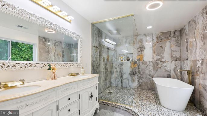 Bathroom, Dual Sink Vanities, Free Standing Baths, Glass Shower, Interior, Marble Walls, Recessed Lighting