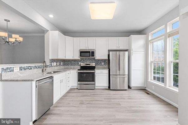 Chandelier, Interior, Kitchen, Recessed Lighting, Stainless Steel Appliances, Wood Texture Flooring