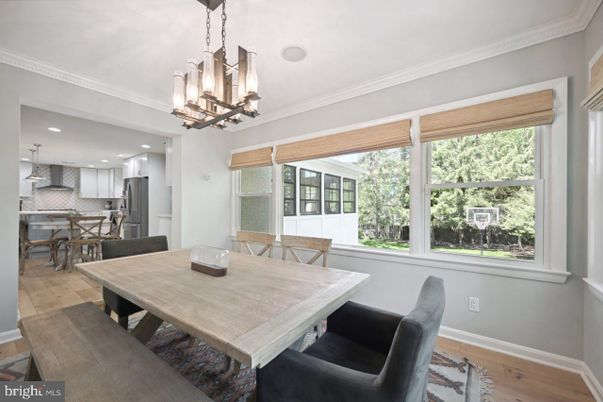 Chandelier, Dining room, Interior, Kitchen, Pendant Lights, Recessed Lighting, Stainless Steel Appliances, Wood Texture Flooring