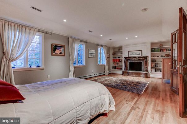 Bedroom, Fireplace, Interior, Recessed Lighting, Wood Texture Flooring