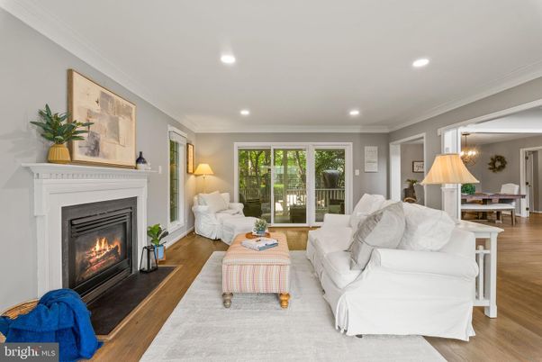 Dining room, Fireplace, Interior, Living room, Recessed Lighting, Wood Texture Flooring