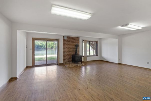Empty room, Fireplace, Interior, Stone Walls, Wood Texture Flooring