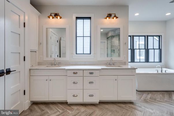 Bathroom, Dual Sink Vanities, Free Standing Baths, Interior, Recessed Lighting, Wood Texture Flooring