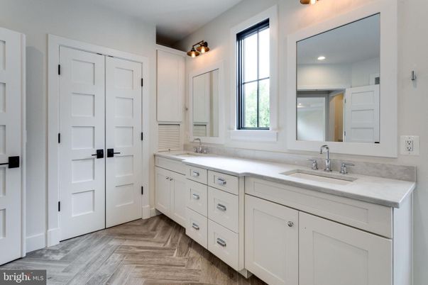 Bathroom, Dual Sink Vanities, Interior, Recessed Lighting, Wood Texture Flooring