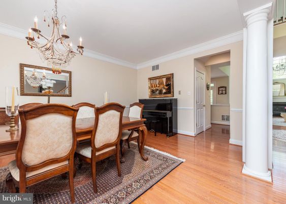 Chandelier, Dining room, Interior, Piano, Wood Texture Flooring