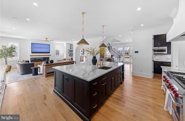 Fireplace, Interior, Kitchen, Living room, Pendant Lights, Recessed Lighting, Stainless Steel Appliances, Wood Texture Flooring