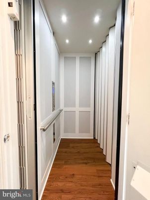 Elevator, Interior, Recessed Lighting, Wood Texture Flooring