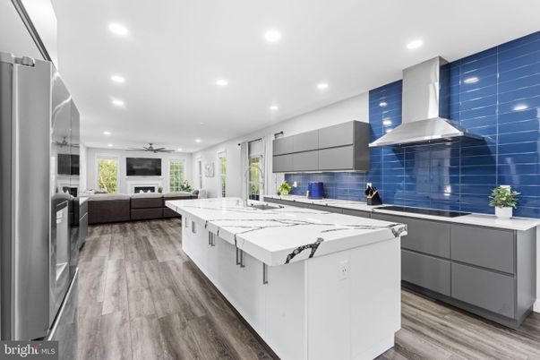 Interior, Kitchen, Living room, Recessed Lighting, Stainless Steel Appliances, Wood Texture Flooring