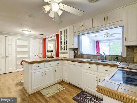 Interior, Kitchen, Tile Countertops, Wood Texture Flooring