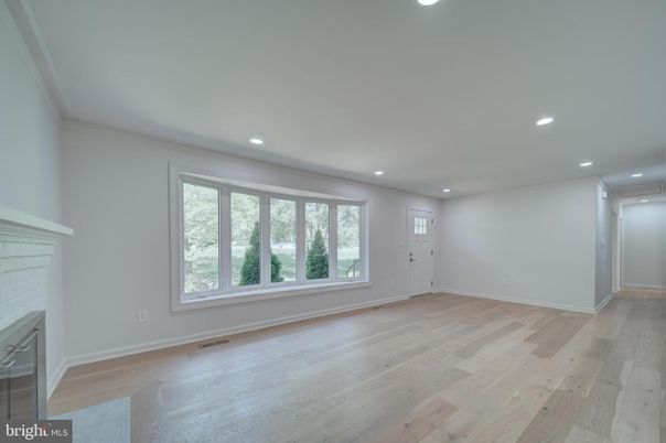 Empty room, Fireplace, Interior, Recessed Lighting, Wood Texture Flooring