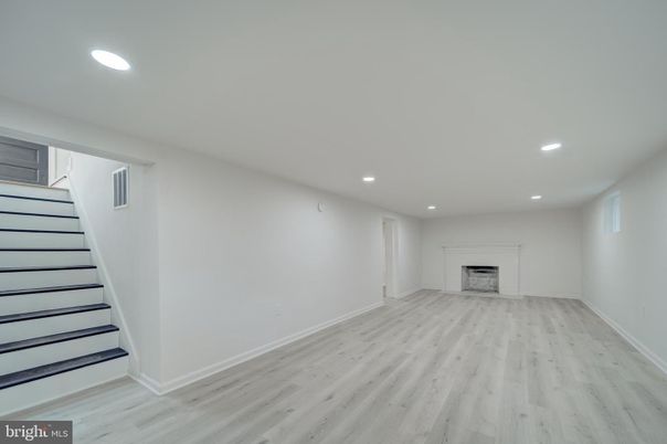 Empty room, Fireplace, Interior, Recessed Lighting, Wood Texture Flooring
