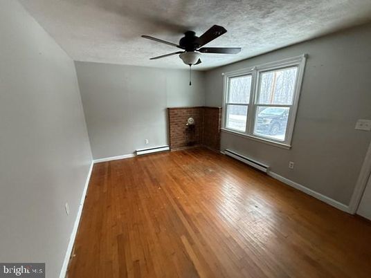 Empty room, Fireplace, Interior, Stone Walls, Wood Texture Flooring