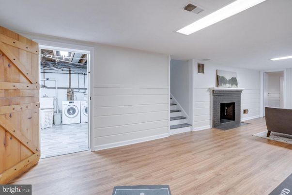 Fireplace, Interior, Recessed Lighting, Utility Closets, Washer, Wood Texture Flooring