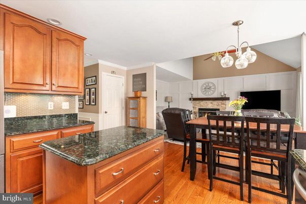 Dining room, Fireplace, Interior, Kitchen, Pendant Lights, Recessed Lighting, Wood Texture Flooring