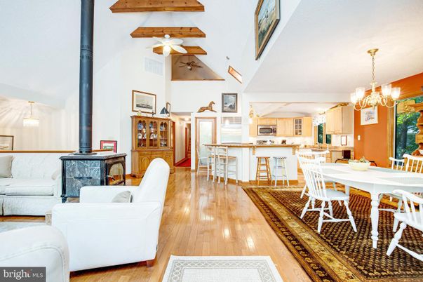 Chandelier, Dining room, Fireplace, Interior, Kitchen, Living room, Pendant Lights, Wooden Beams, Wood Texture Flooring