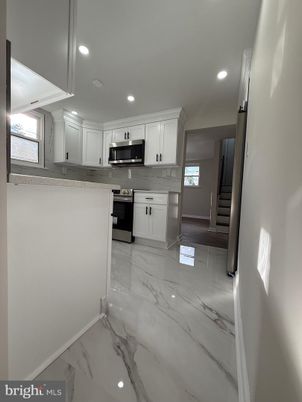 Interior, Kitchen, Marble, Recessed Lighting, Stainless Steel Appliances