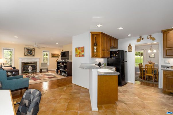 Dining room, Fireplace, Interior, Kitchen, Living room, Recessed Lighting, Wood Texture Flooring
