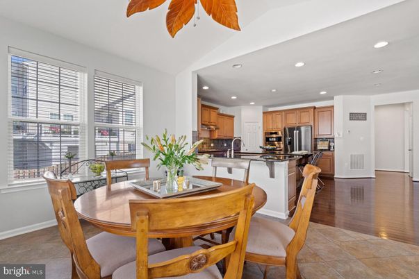 Dining room, Interior, Kitchen, Recessed Lighting, Stainless Steel Appliances, Wood Texture Flooring