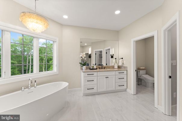 Bathroom, Chandelier, Dual Sink Vanities, Free Standing Baths, Interior, Marble, Pendant Lights, Recessed Lighting