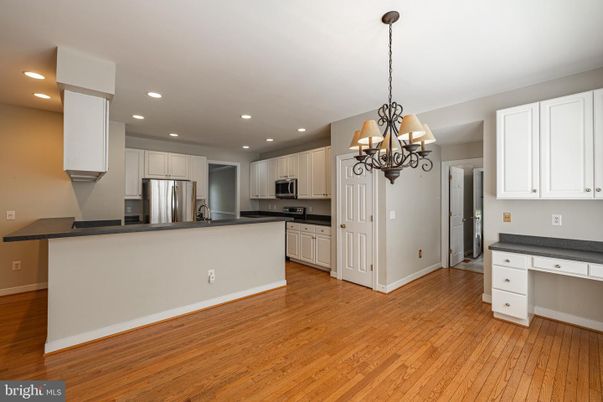 Chandelier, Interior, Kitchen, Recessed Lighting, Stainless Steel Appliances, Wood Texture Flooring
