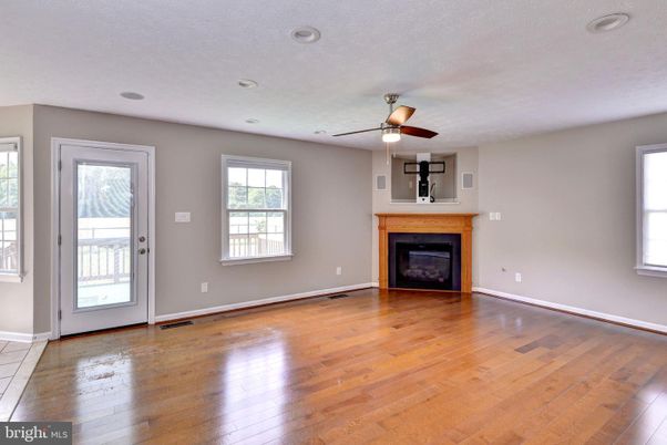 Empty room, Fireplace, Interior, Recessed Lighting, Wood Texture Flooring