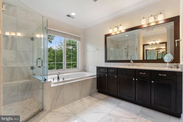 Bathroom, Dual Sink Vanities, Glass Shower, Interior, Marble, Marble Walls, Recessed Lighting