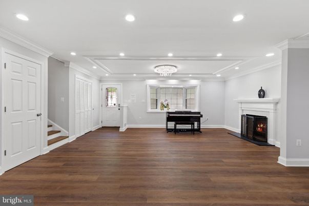 Billiard Table, Chandelier, Fireplace, Game Room, Interior, Piano, Recessed Lighting, Wood Texture Flooring