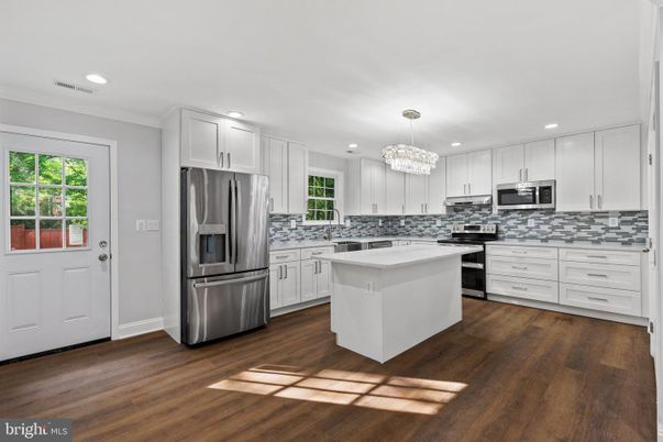 Chandelier, Interior, Kitchen, Recessed Lighting, Stainless Steel Appliances, Wood Texture Flooring