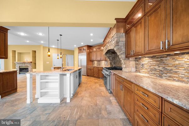 Fireplace, Interior, Kitchen, Pendant Lights, Recessed Lighting, Stone Walls