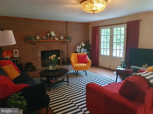 Chandelier, Fireplace, Interior, Living room, Stone Walls, Wood Texture Flooring