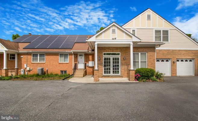 Attached, Exterior, Facade, Brick Facade, Solar Panels, Brick Traditional