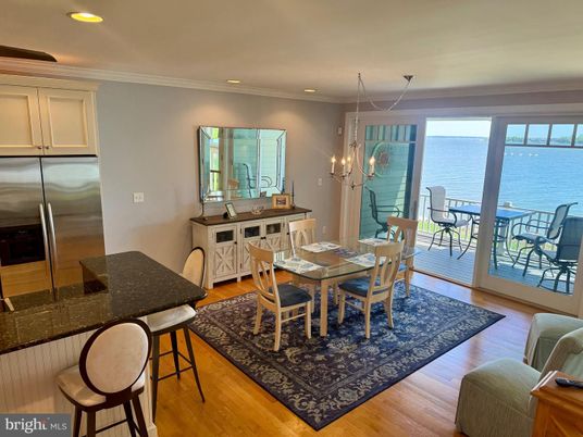 Chandelier, Dining room, Interior, Kitchen, Recessed Lighting, Stainless Steel Appliances, Water, Wood Texture Flooring