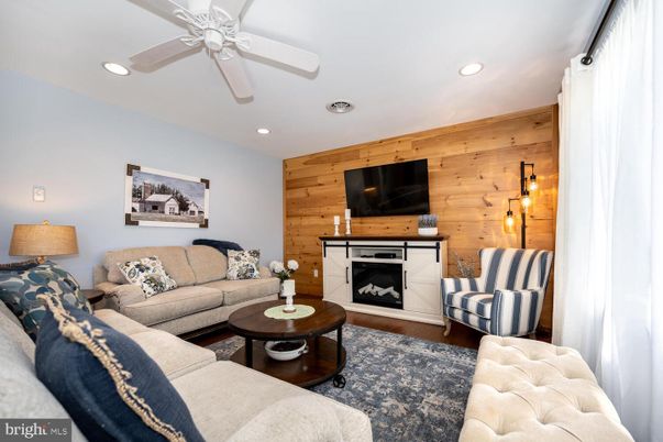 Fireplace, Interior, Living room, Recessed Lighting, Wood Texture Flooring, Wooden Walls
