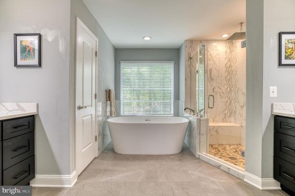 Bathroom, Free Standing Baths, Glass Shower, Interior, Marble Walls, Recessed Lighting