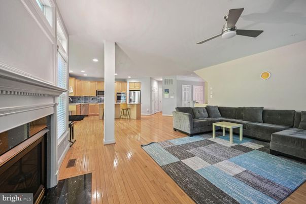 Fireplace, Interior, Kitchen, Living room, Recessed Lighting, Wood Texture Flooring