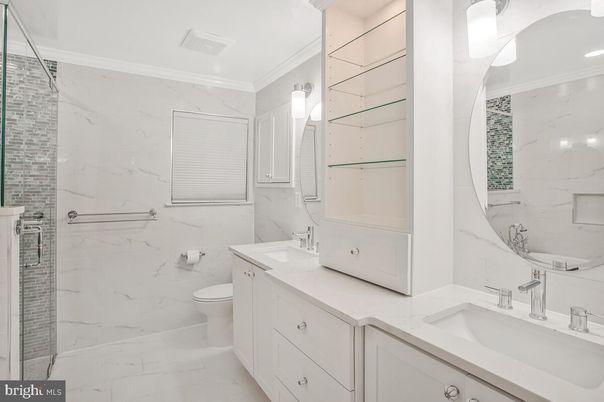 Bathroom, Dual Sink Vanities, Interior, Marble, Marble Walls, Recessed Lighting