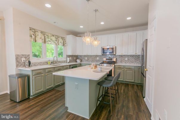 Chandelier, Interior, Kitchen, Pendant Lights, Recessed Lighting, Stainless Steel Appliances, Wood Texture Flooring