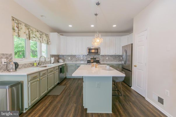Chandelier, Interior, Kitchen, Recessed Lighting, Stainless Steel Appliances, Wood Texture Flooring