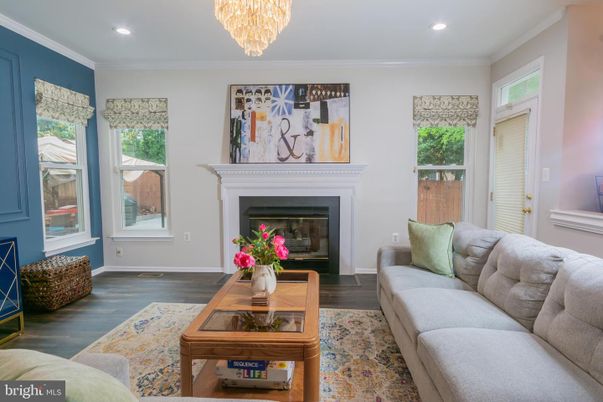 Chandelier, Fireplace, Interior, Living room, Recessed Lighting, Wood Texture Flooring