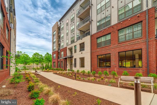 Exterior, Facade, Brick Facade, Condo Building
