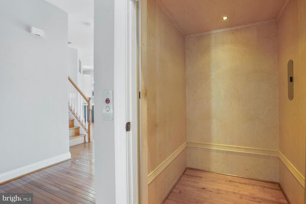 Elevator, Interior, Recessed Lighting, Wood Texture Flooring, Wooden Walls