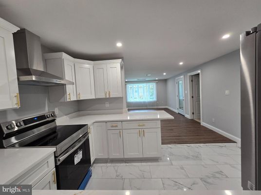Interior, Kitchen, Marble, Recessed Lighting, Stainless Steel Appliances, Wood Texture Flooring