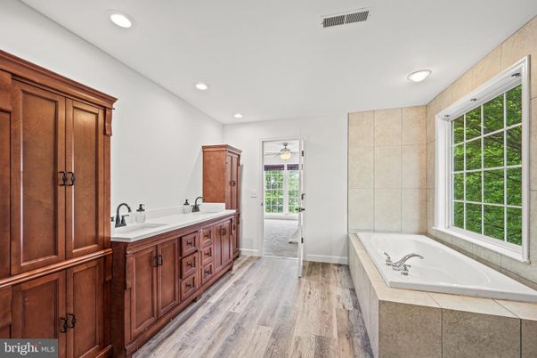 Bathroom, Dual Sink Vanities, Interior, Recessed Lighting, Wood Texture Flooring